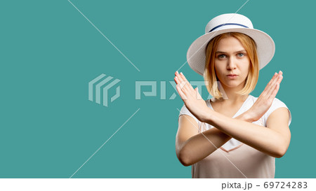 stop sign forbidden gesture serious woman hand 69724283