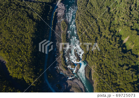 Aerial landscape of Osorno Volcano and Falls of Petrohue - Puerto Varas, Chile, South America. Aerial landscape of Osorno Volcano and Falls of Petrohue - Puerto Varas, Chile, South America. 69725073