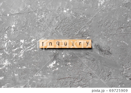 inquiry word written on wood block. inquiry text on table, concept 69725909