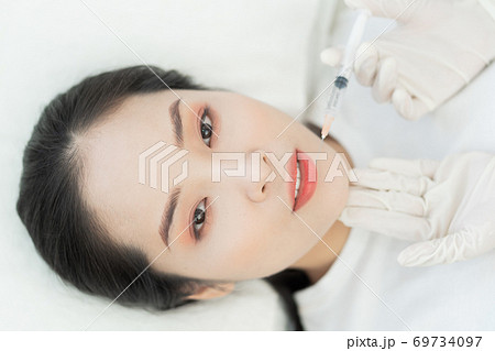 Woman, Cosmetic Surgery Woman, Cosmetic Surgery 69734097