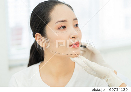 Woman cosmetic surgery Woman cosmetic surgery 69734129