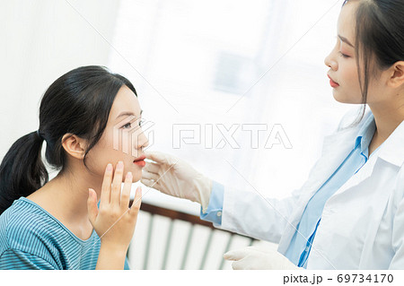 Woman, doctor, clinic 69734170