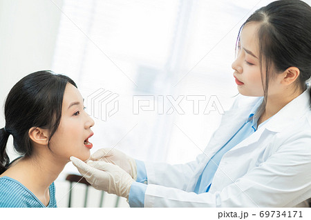 Woman, doctor, clinic Woman, doctor, clinic 69734171