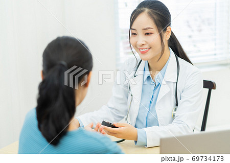 Woman, doctor, clinic 69734173