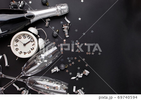 New Year Eve composition on black background. New Year Eve composition on black background. 69740594