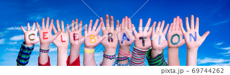Children Hands Building Word Celebration, Blue Sky 69744262