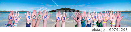 Children Hands Building Word As Soon As Possible, Ocean Background 69744293