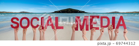 People Hands Holding Word Social Media, Ocean Background 69744312