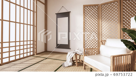 Wooden Arm chair and partition japanese on room tropical interior with tatami mat floor and white wall.3D rendering Wooden Arm chair and partition japanese on room tropical interior with tatami mat floor and white wall.3D rendering 69753722