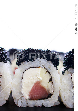 Sushi rolls with tuna and black caviar, copy space Sushi rolls with tuna and black caviar, copy space 69756220