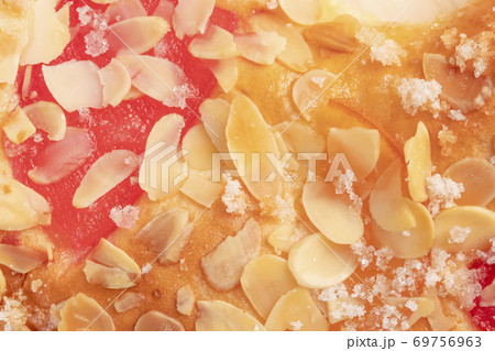 Spanish typical Epiphany cake Roscon de Reyes with fruit, background 69756963