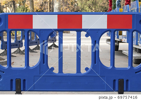 Without entry, prohibiting sign on the road, fencing, stopping the passage Without entry, prohibiting sign on the road, fencing, stopping the passage 69757416