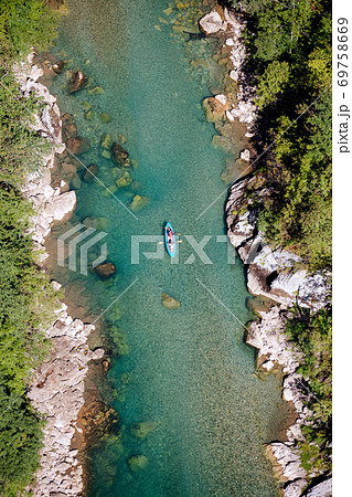 men canoeing in river men canoeing in river 69758669