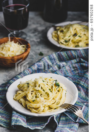 Portions of Pasta Alfredo 69760268