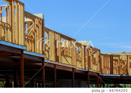 Wood building frame structure on a new development 69764205