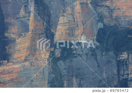 A cliff face in Jamison Valley in The Blue Mountains in New South Wales in Australia A cliff face in Jamison Valley in The Blue Mountains in New South Wales in Australia 69765472