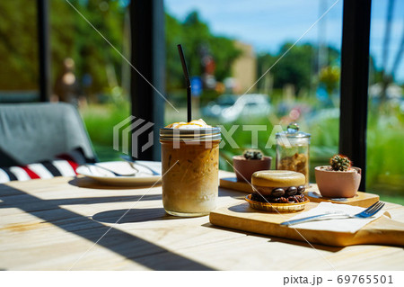 iced coffee with sweet cake in cafe iced coffee with sweet cake in cafe 69765501