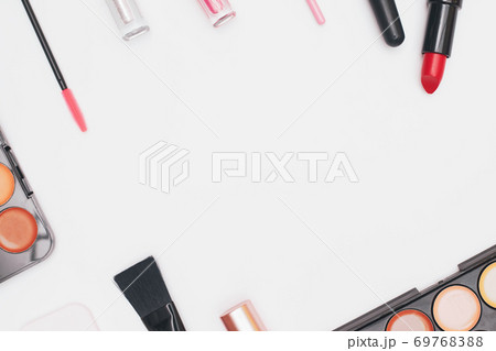 set of professional cosmetics, makeup tools and accessories isolated on white background, beauty, fashion, shopping concept, flat lay 69768388