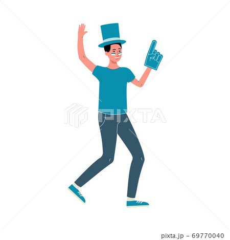 Football fan in team color hat, foam hand and face paint cheering Football fan in team color hat, foam hand and face paint cheering 69770040