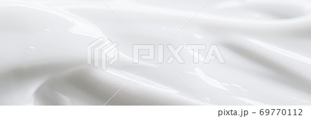 Pure white cream texture as abstract background, food substance or organic cosmetic Pure white cream texture as abstract background, food substance or organic cosmetic 69770112