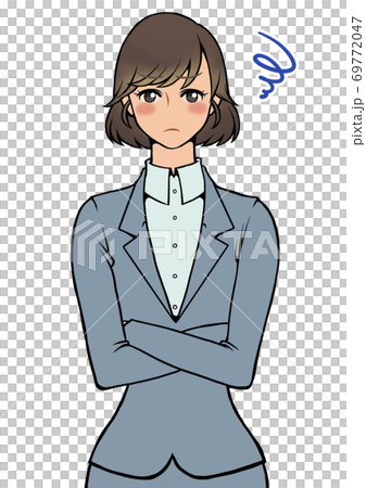 A woman in a moody suit with her arms folded A woman in a moody suit with her arms folded 69772047