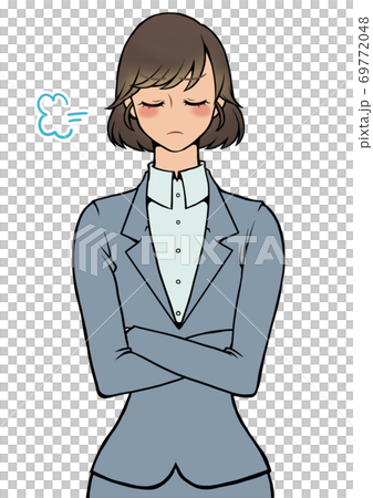 Woman in an angry suit with her arms folded Woman in an angry suit with her arms folded 69772048