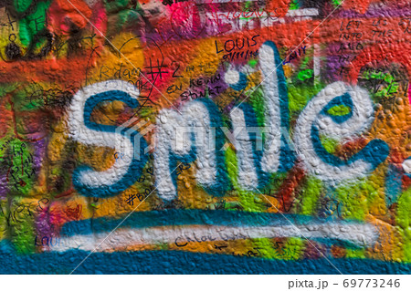 Graffiti on the wall of John Lennon in Prague - Czech Republic Graffiti on the wall of John Lennon in Prague - Czech Republic 69773246