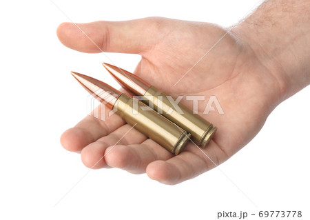 Hand with bullets 69773778