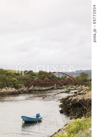 small blue boat 69773934