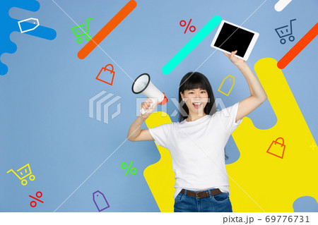 Asian woman's portrait isolated on bright, modern illustrated background. 69776731