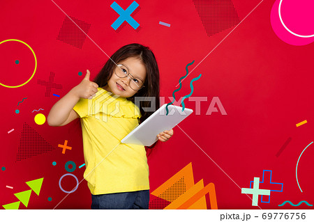 Asian little girl portrait isolated on bright, modern illustrated background. Asian little girl portrait isolated on bright, modern illustrated background. 69776756