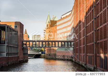 The Warehouse District or Speicherstadt in Hamburg. Wandrahmsfleet canal The Warehouse District or Speicherstadt in Hamburg. Wandrahmsfleet canal 69777903