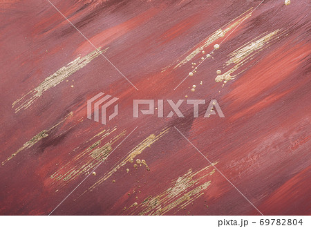 Terracotta marble background with gold brushstrokes and drops Terracotta marble background with gold brushstrokes and drops 69782804