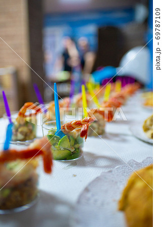 Table full of food at a party 69787109