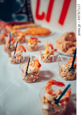 Table full of food at a party 69787117