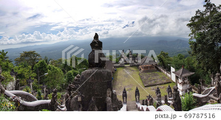 Temple Pura Lempuyang and view of a volcano Agung. Bali. Indonesia Temple Pura Lempuyang and view of a volcano Agung. Bali. Indonesia 69787516