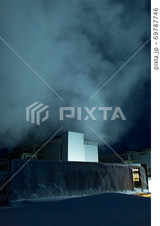 Night view. Thermal power plant building at a hot spring. Icelandic industry 69787746