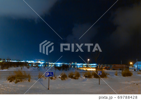 Night photo of Reykjavik city beach. Waterfront lights 69788428