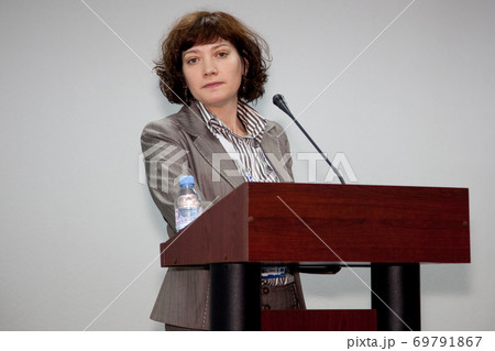 Public speaker giving talk at Business Event Public speaker giving talk at Business Event 69791867