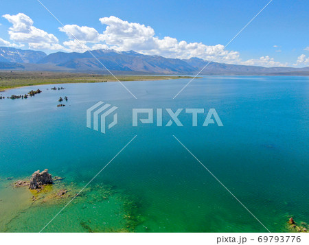 Aerial view of Mono Lake with tufa rock formations during summer season, Mono County Aerial view of Mono Lake with tufa rock formations during summer season, Mono County 69793776