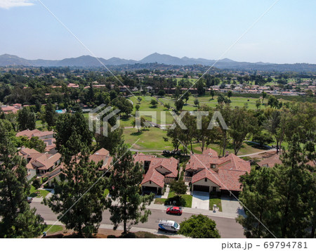 Aerial view of middle class neighborhood with residential house community, San Diego Aerial view of middle class neighborhood with residential house community, San Diego 69794781