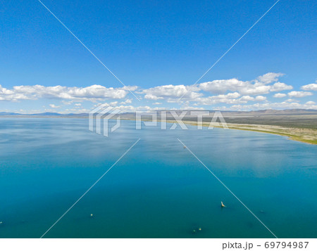 Aerial view of Mono Lake with tufa rock formations during summer season, Mono County 69794987