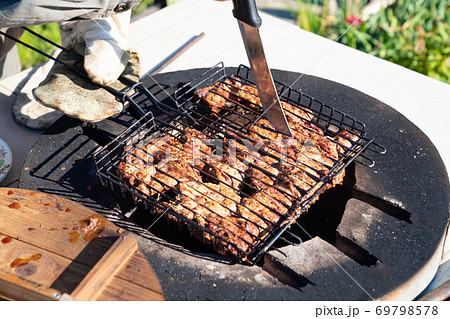 meat is cooked inside above ground  tandir oven 69798578