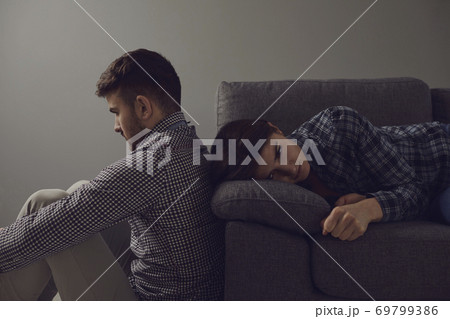 Unhappy couple quarreling offended in a divorce. 69799386