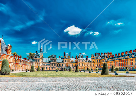 FONTAINEBLEAU, FRANCE - JULY 09, 2016 :Suburban Residence of the France Kings - facade  beautiful Chateau Fontainebleau and surrounding his park. 69802017