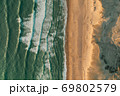 Beautiful Empty Beach textures and waves with white foam, Aerial Birds Eye Overhead Top Down View from above 69802579