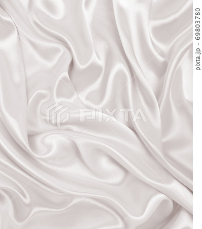 Smooth elegant golden silk or satin luxury cloth texture as wedding background. Luxurious background design. In Sepia toned. Retro style Smooth elegant golden silk or satin luxury cloth texture as wedding background. Luxurious background design. In Sepia toned. Retro style 69803780