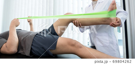 Male patients consulted physiotherapists with knee pain problems for examination and treatment. Rehabilitation physiotherapy concept 69804262