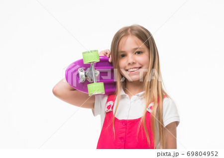 Child skater smiling with longboard. Born to be a Child skater smiling with longboard. Born to be a 69804952