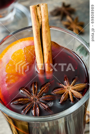 Christmas mulled wine and Christmas decoration on wooden table Christmas mulled wine and Christmas decoration on wooden table 69808989